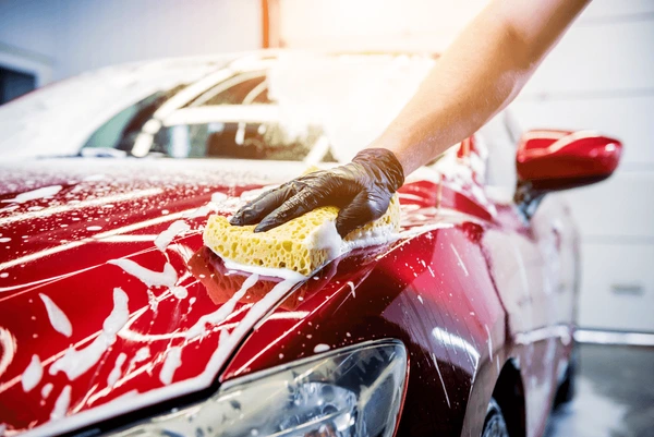 worker-washing-red-car-sponge-600nw-1859193349 worker-washing-red-car-sponge-600nw-1859193349
